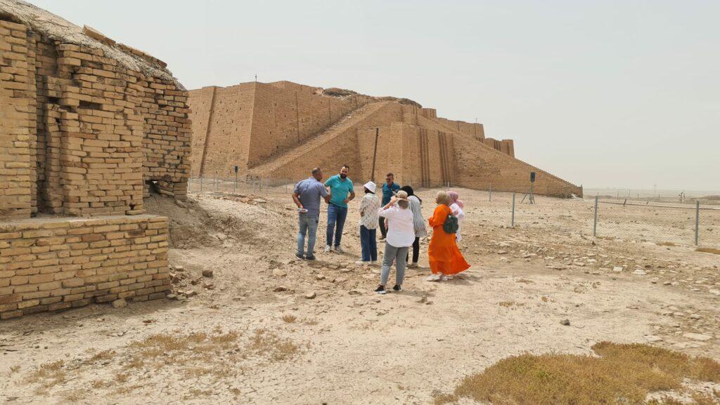 Trainees visiting the ziggurat at Ur for field work